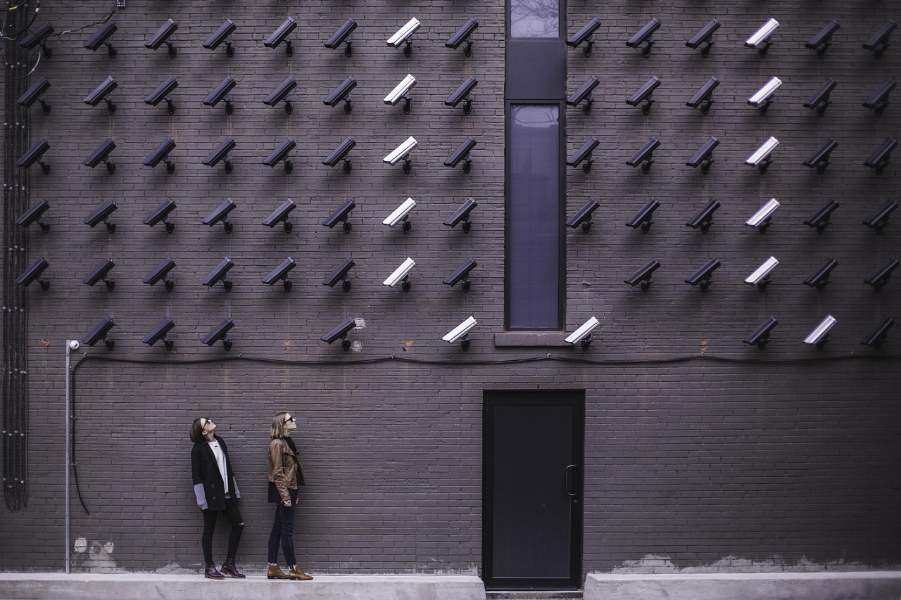 building, cctv, door, female, ladies, pattern, people, security cameras, shape, steel and concrete structure, wall, women, gray building, gray camera, gray wall, gray security, gray door, gray pattern, gray lady, cctv, cctv, cctv, cctv, cctv